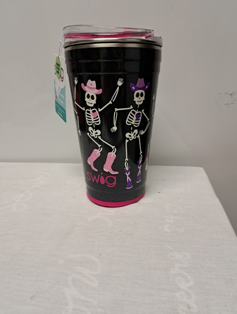 24oz SWIG Life Black Skeleton Cowboy Tumbler with Pink & Purple Accents